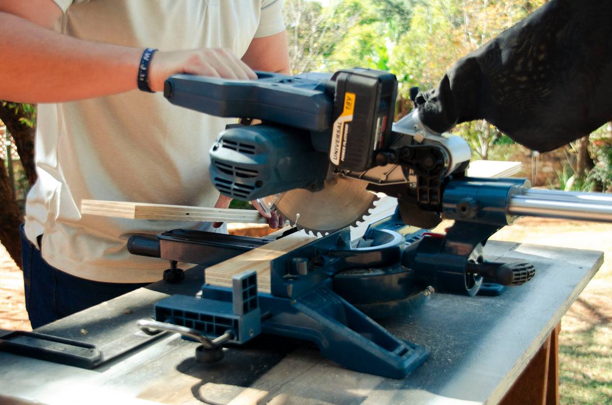 Close-up of a performance power tools scroll saw making a precise curved cut in hardwood